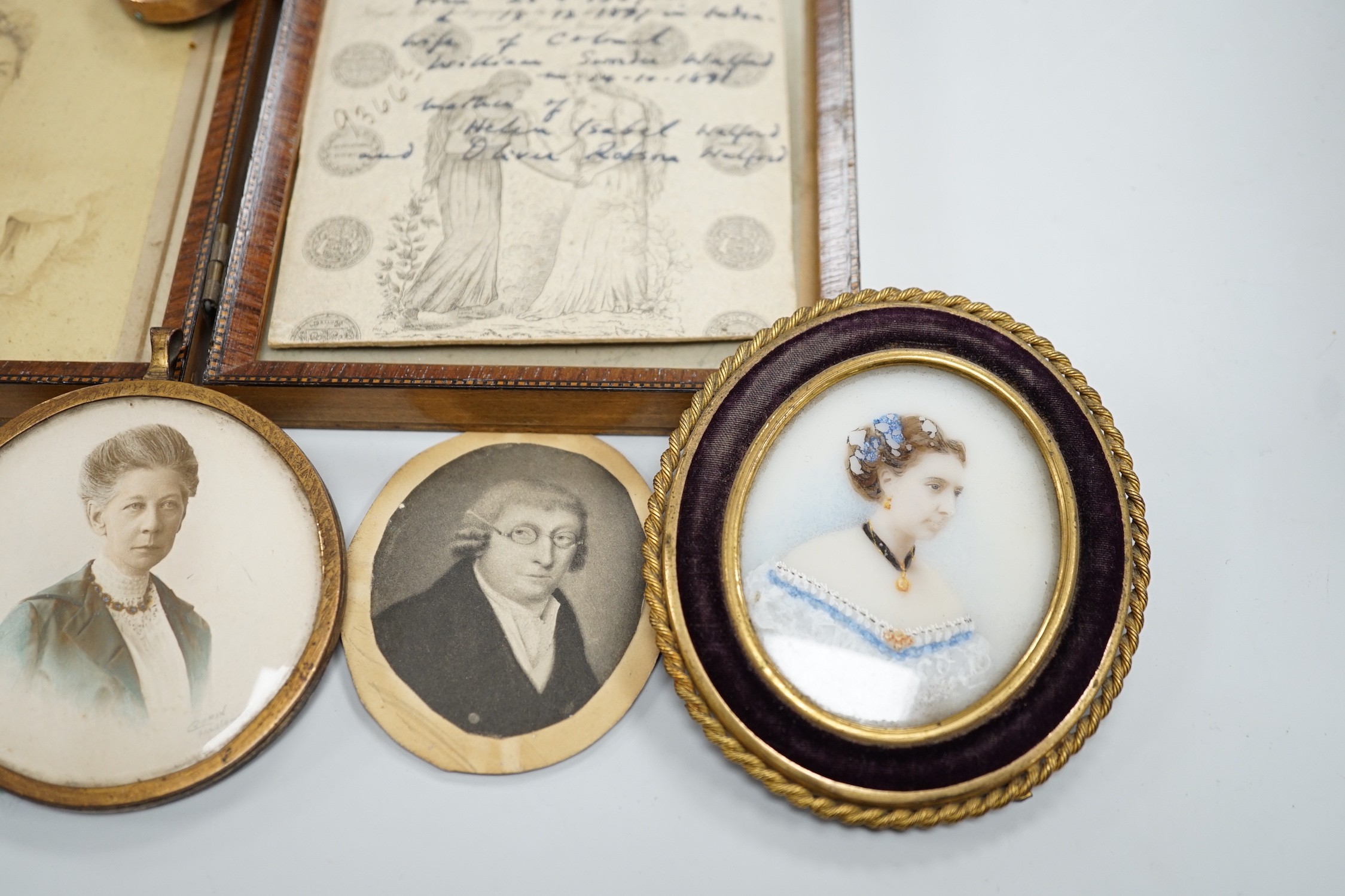 A selection of portrait photographs and miniatures relating to the Robson Family. To include the subjects of: Mary Jane Robson, Caroline Eliza Robson (1852-1947), photograph taken by Walter Charles Corin of Haslemere, Ma